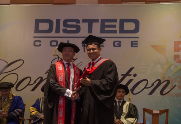 CHAYAKORN SUWANNACHOT from Thailand receiving his award in BA (hons) International Business Management from Prof Dr Ieuan Ellis, Pro Vice Chancellor of Staffordshire University, UK.
